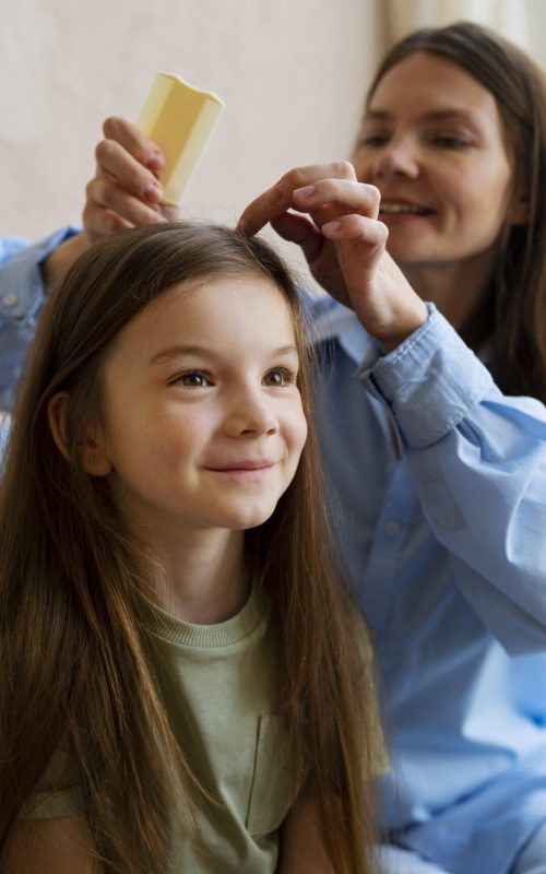 medium-shot-smiley-woman-combing-hair