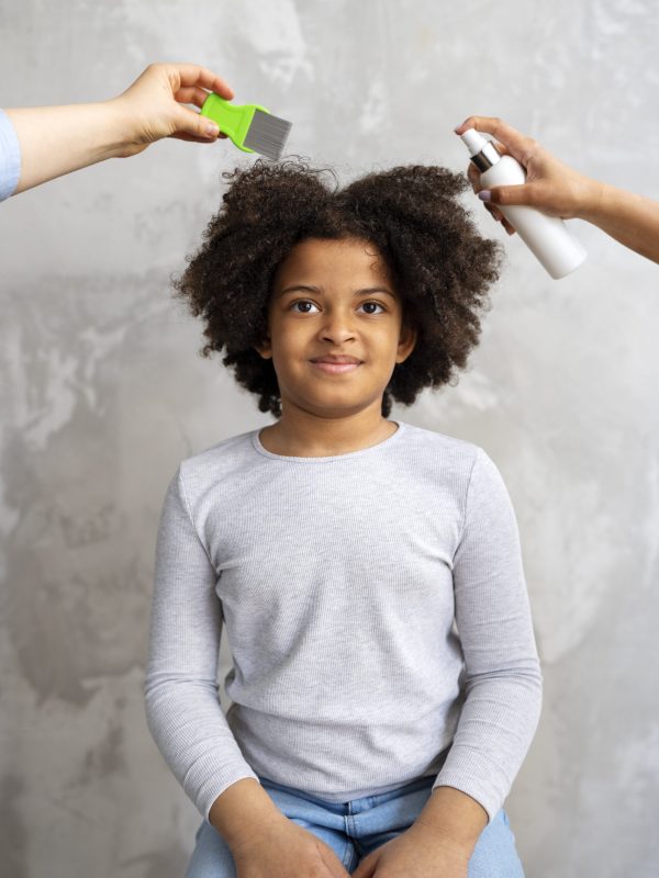 smiley-girl-with-spray-treatment-front-view